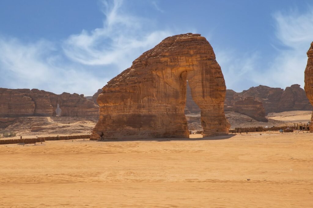 Elephant Rock sandstone formation in AlUla under a blue sky