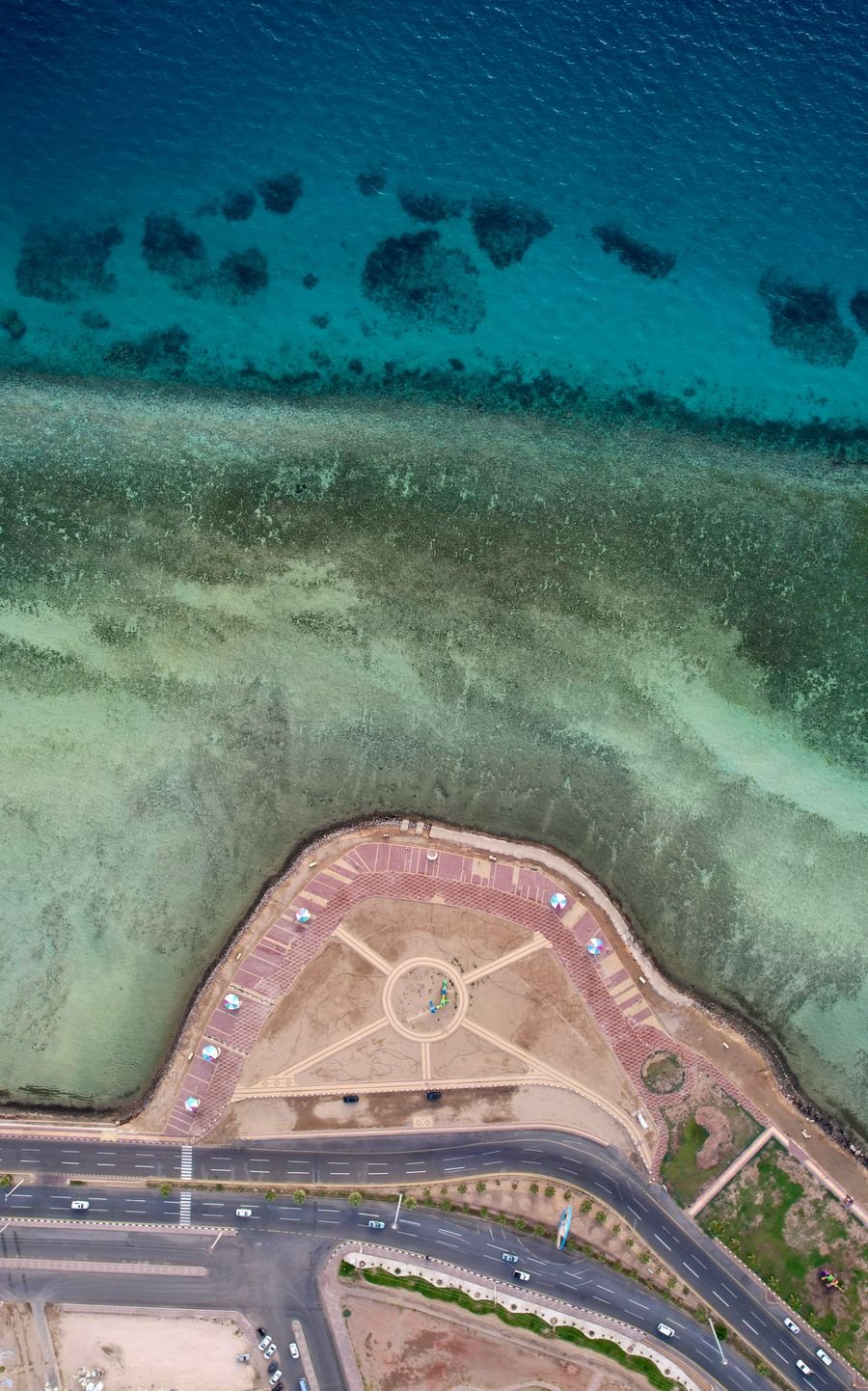 Aerial view of the Umluj coastline with clear Red Sea water